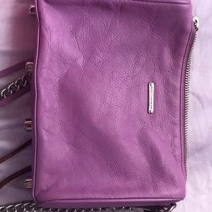 A small purple Rebecca Minkoff purse